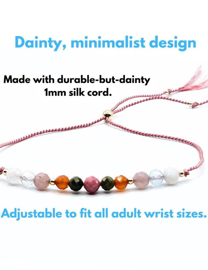 A nurturing fertility bracelet with moonstone, aquamarine, rhodonite, rose quartz, and unakite, accented with sterling silver on an adjustable pink silk cord. Designed to support fertility and emotional well-being.